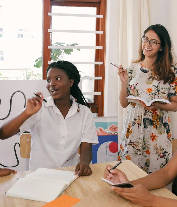 Diverse group of office workers looking relaxed and happy.